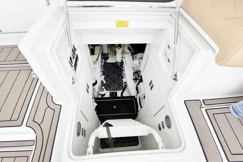 My Way Yacht Photos Pics Engine compartment of 2019 Viking 44 Convertible yacht, showcasing interior details and equipment.