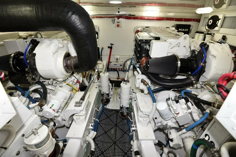 My Way Yacht Photos Pics Engine room of 2019 Viking 44 Convertible yacht, featuring advanced machinery and components.