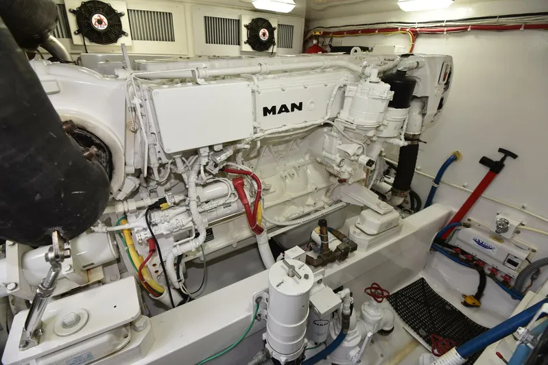 My Way Yacht Photos Pics Engine room of 2019 Viking 44 Convertible yacht featuring a MAN engine.