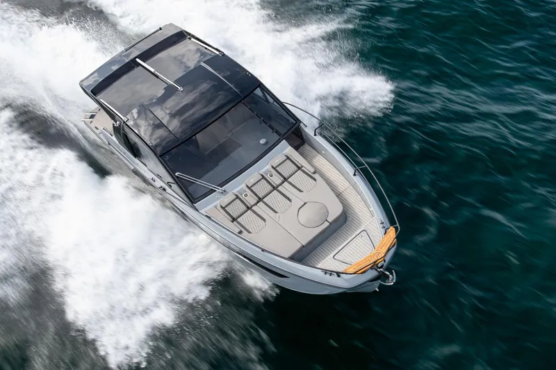  Yacht Photos Pics 2025 Hanover 387 boat cruising on open water, aerial view.