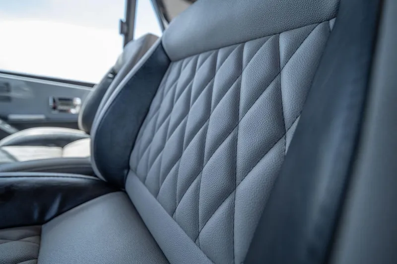  Yacht Photos Pics Luxurious interior of 2025 Hanover 387 with quilted leather seats.