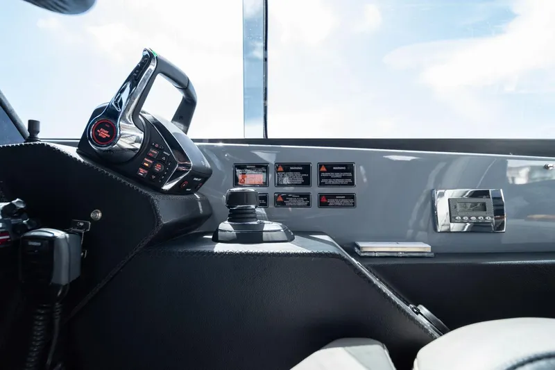  Yacht Photos Pics Control panel of a 2025 Hanover 387 boat, featuring modern navigation and control systems.
