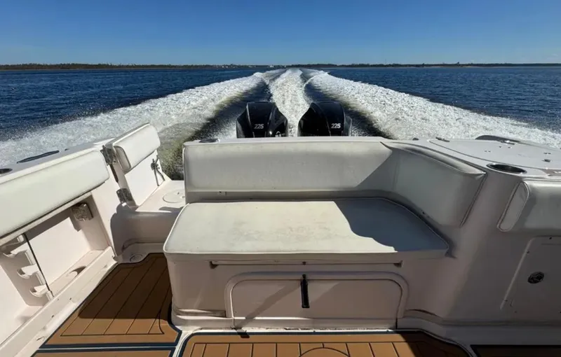  Yacht Photos Pics 2003 Grady-White Marlin 300 boat cruising on open water, view from the deck.