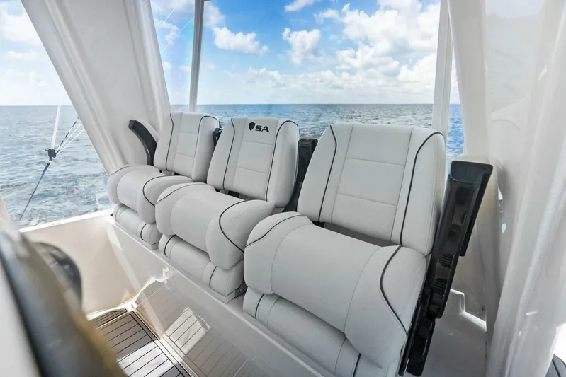 Fish Wish Yacht Photos Pics Luxurious seating on 2023 SeaVee 450z boat with ocean view.