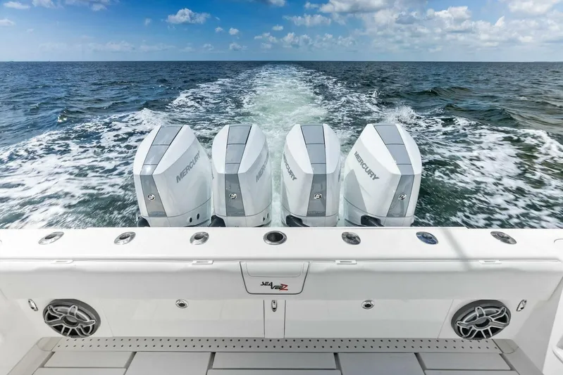 Fish Wish Yacht Photos Pics 2023 SeaVee 450z boat with four Mercury outboard engines on open water.