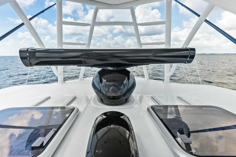 Fish Wish Yacht Photos Pics 2023 SeaVee 450z boat deck with ocean view and clear sky.