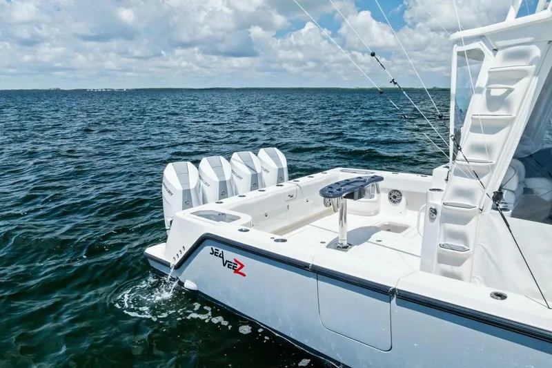 Fish Wish Yacht Photos Pics 2023 SeaVee 450z boat with quad engines on open water.
