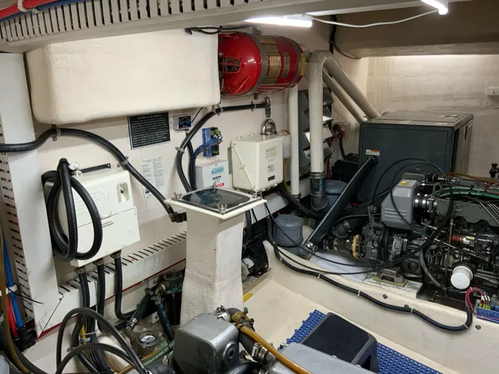 Lone Star (former/recently Andros) Yacht Photos Pics Engine room of 2008 Great Harbour N37 boat with equipment and fire extinguisher.