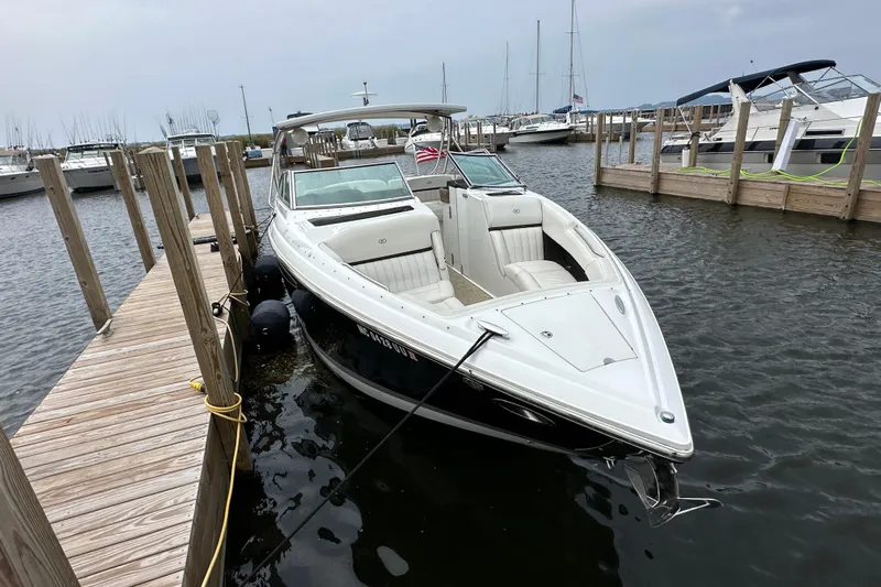  Yacht Photos Pics 2015 Cobalt 336 boat docked at marina, featuring sleek design and spacious seating.