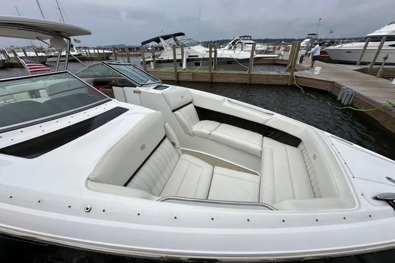  Yacht Photos Pics 2015 Cobalt 336 boat with white seating docked at marina.