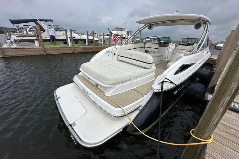  Yacht Photos Pics 2015 Cobalt 336 boat docked, featuring spacious seating and sleek design.