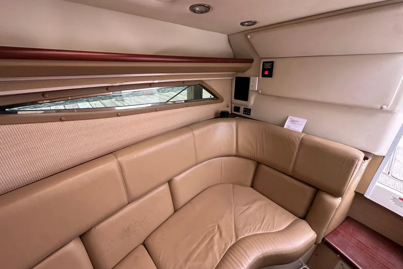  Yacht Photos Pics Luxurious interior of 2015 Cobalt 336 boat with tan leather seating and modern amenities.