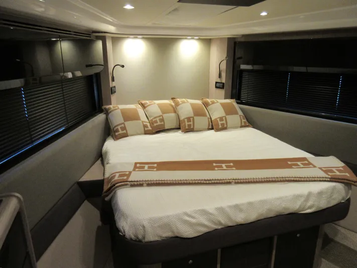 Bellisima Yacht Photos Pics Luxurious bedroom interior of 2019 Azimut Atlantis 51 yacht with elegant bedding.