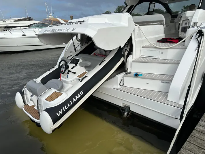 Bellisima Yacht Photos Pics 2019 Azimut Atlantis 51 yacht with a Williams tender on the water.