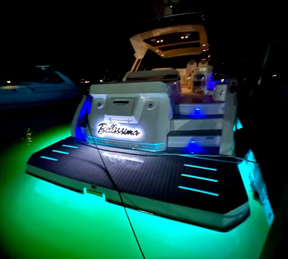 Bellisima Yacht Photos Pics 2019 Azimut Atlantis 51 yacht with illuminated deck at night.