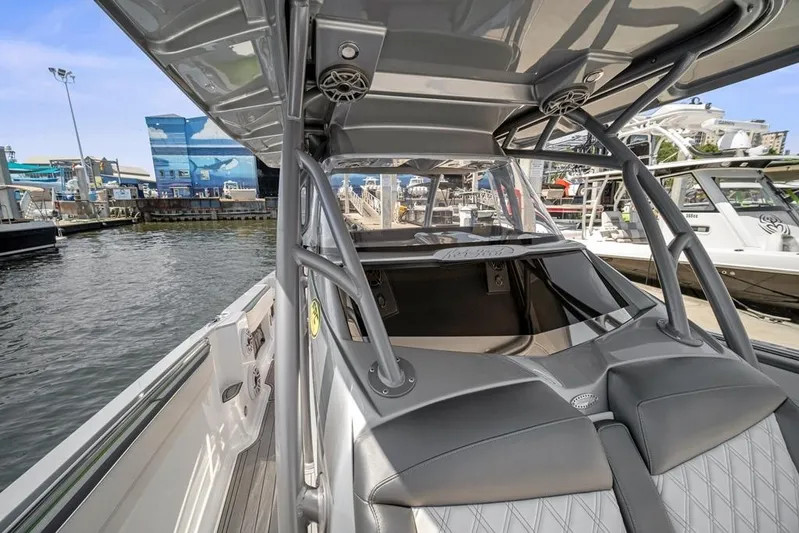  Yacht Photos Pics 2021 Nor-Tech 390 Sport Center Console boat docked at marina, showcasing sleek design.