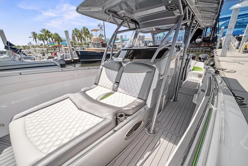  Yacht Photos Pics 2021 Nor-Tech 390 Sport Center Console boat with sleek seating and modern design at a marina.