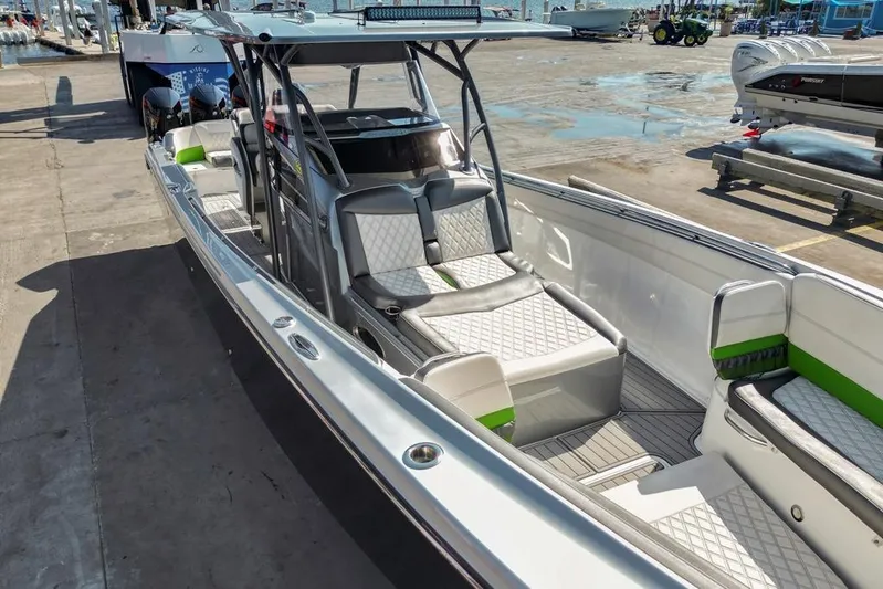  Yacht Photos Pics 2021 Nor-Tech 390 Sport Center Console boat with sleek design and spacious seating.