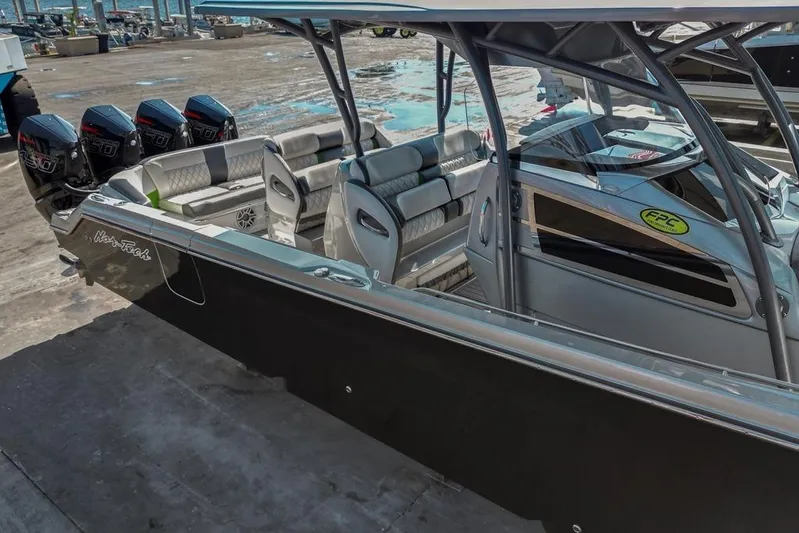  Yacht Photos Pics 2021 Nor-Tech 390 Sport Center Console boat with quad engines docked at marina.