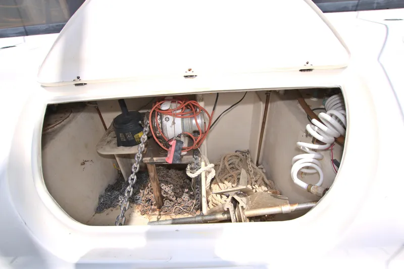 Route 66 Yacht Photos Pics Anchor locker of 2005 Dolphin 460 Sail Cat with chain, ropes, and equipment.