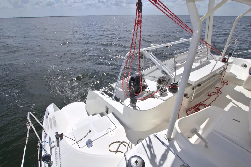 Route 66 Yacht Photos Pics 2005 Dolphin 460 Sail Catamaran on open water, featuring deck and rigging details.