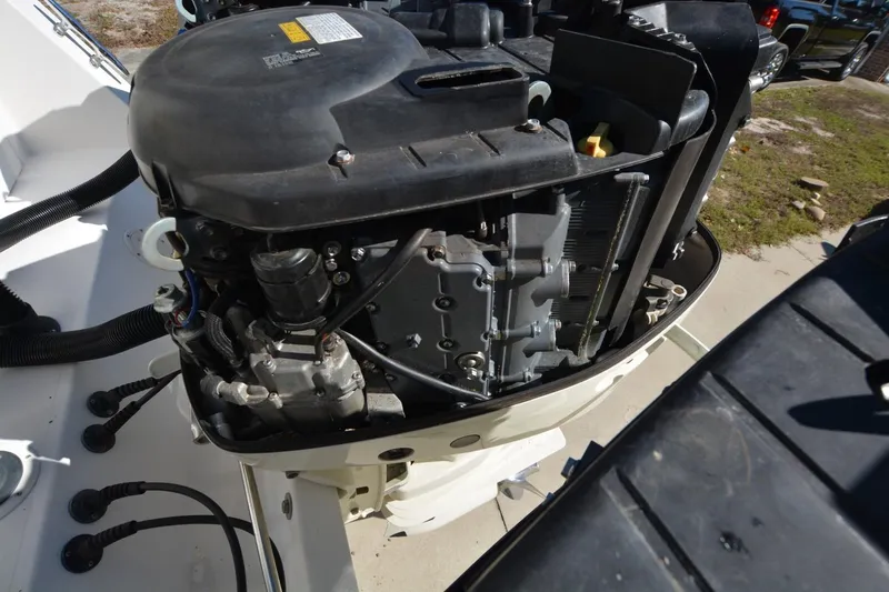 Hot Hooks Yacht Photos Pics 2006 Contender 33 Tournament boat engine close-up, showcasing mechanical components and wiring.