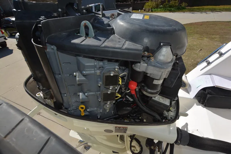 Hot Hooks Yacht Photos Pics 2006 Contender 33 Tournament boat engine, detailed view of motor components.