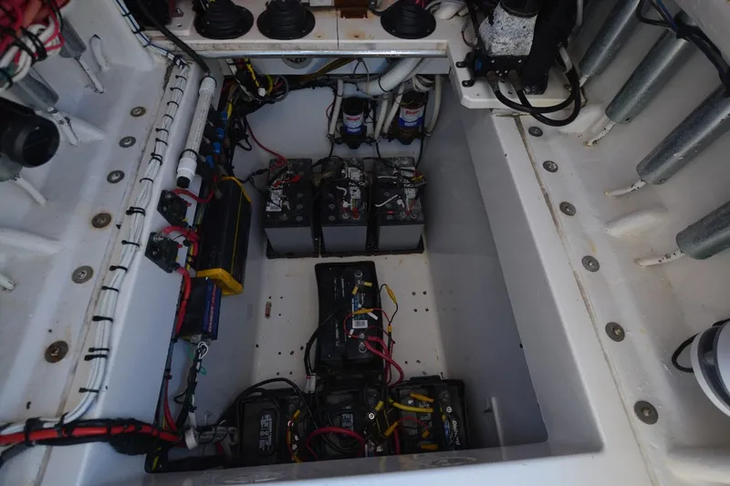 Hot Hooks Yacht Photos Pics Electrical compartment of 2006 Contender 33 Tournament boat with batteries and wiring.