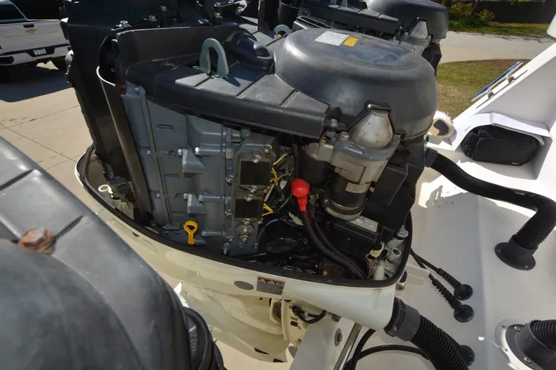 Hot Hooks Yacht Photos Pics 2006 Contender 33 Tournament boat engine, detailed view of motor components.