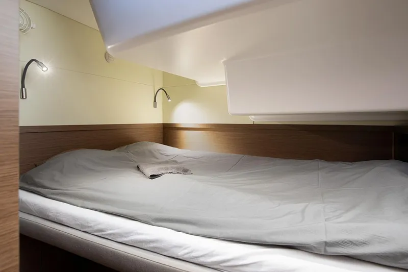 Aliana Yacht Photos Pics Cozy cabin bed in 2022 Lagoon 50 yacht with modern lighting.