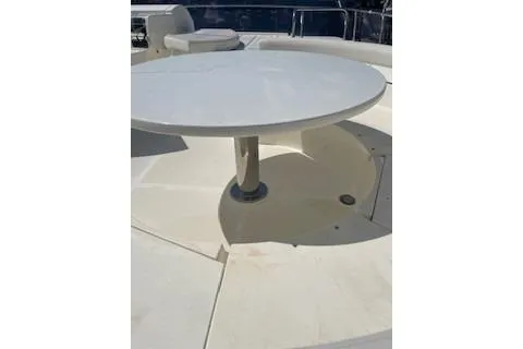  Yacht Photos Pics 2009 Ferretti Yachts 681 deck with round table and seating area.