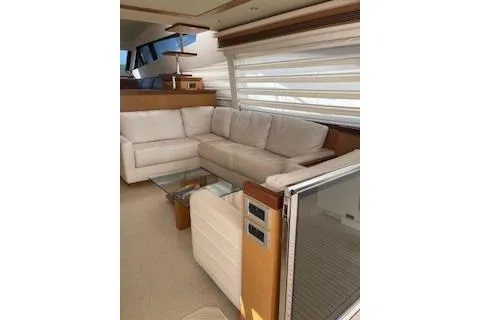  Yacht Photos Pics Luxurious interior of 2009 Ferretti Yachts 681 with elegant white seating and modern decor.