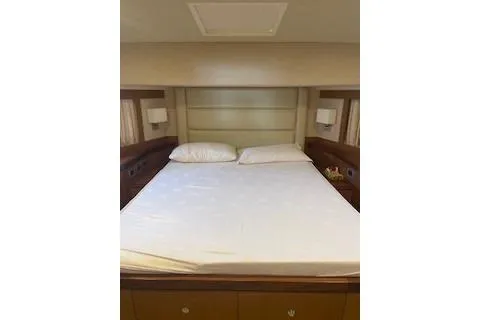 Yacht Photos Pics 2009 Ferretti Yachts 681 bedroom interior with double bed and modern design.