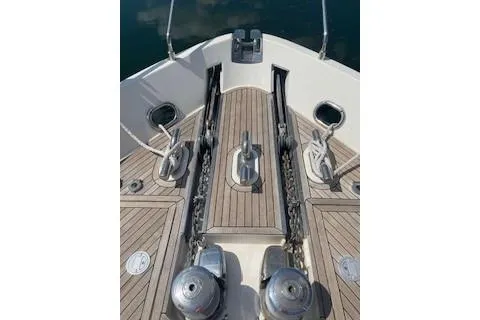  Yacht Photos Pics 2009 Ferretti Yachts 681 bow deck with anchor chains and teak flooring.