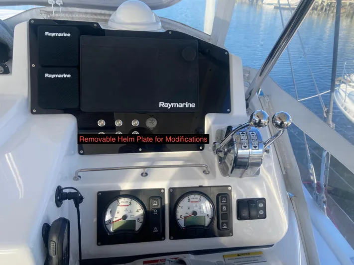 Why Knot Yacht Photos Pics Helm controls of a 2020 Robertson Leopard boat with Raymarine equipment and modification options.