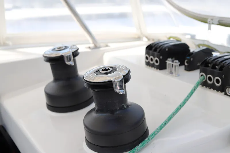 Why Knot Yacht Photos Pics Close-up of winches and rope on a 2020 Robertson Leopard boat deck.