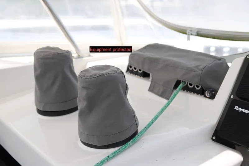 Why Knot Yacht Photos Pics Covered equipment on a 2020 Robertson Leopard boat deck with protective gear.