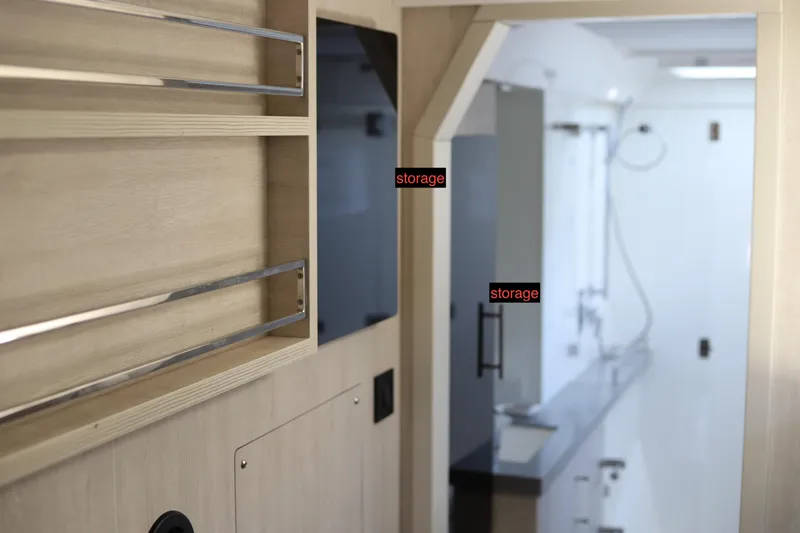 Why Knot Yacht Photos Pics Interior of 2020 Robertson Leopard with storage shelves and modern design.