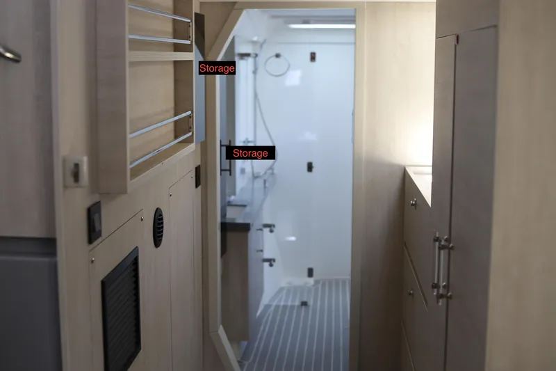 Why Knot Yacht Photos Pics Interior of 2020 Robertson Leopard with wooden storage cabinets and modern design.