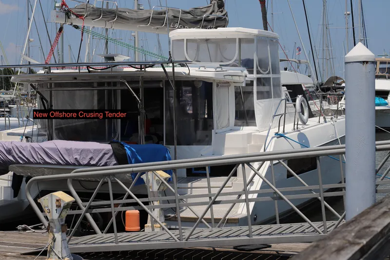 Why Knot Yacht Photos Pics 2020 Robertson Leopard yacht docked, labeled "New Offshore Cruising Tender."