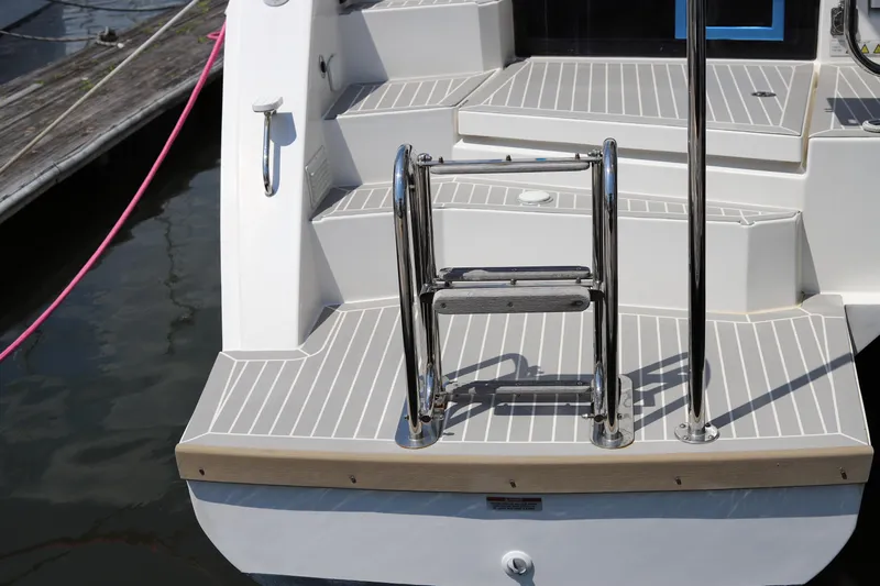 Why Knot Yacht Photos Pics Stainless steel ladder on 2020 Robertson Leopard yacht deck.