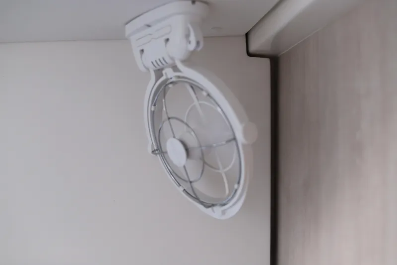 Why Knot Yacht Photos Pics Ceiling-mounted fan in a Robertson Leopard 2020 model interior.