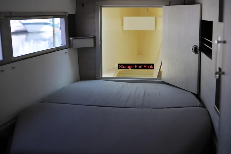 Why Knot Yacht Photos Pics Interior cabin of 2020 Robertson Leopard boat with storage port peak access.