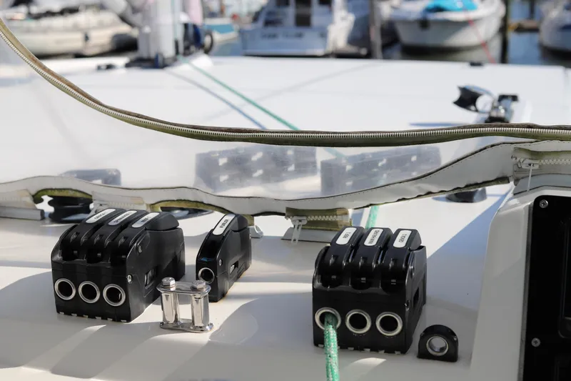 Why Knot Yacht Photos Pics Close-up of a 2020 Robertson Leopard yacht's deck equipment and rope system.