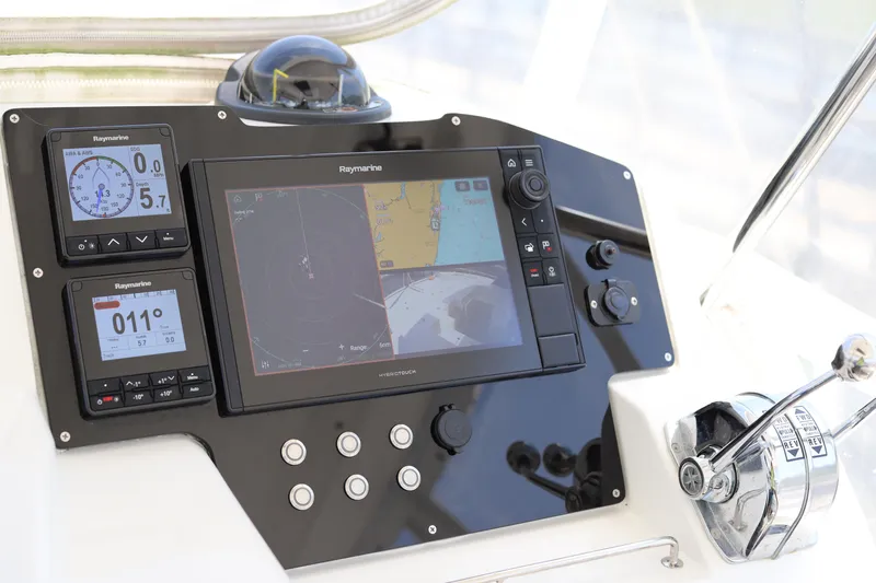 Why Knot Yacht Photos Pics Boat control panel with Raymarine navigation system, Robertson Leopard 2020 model.
