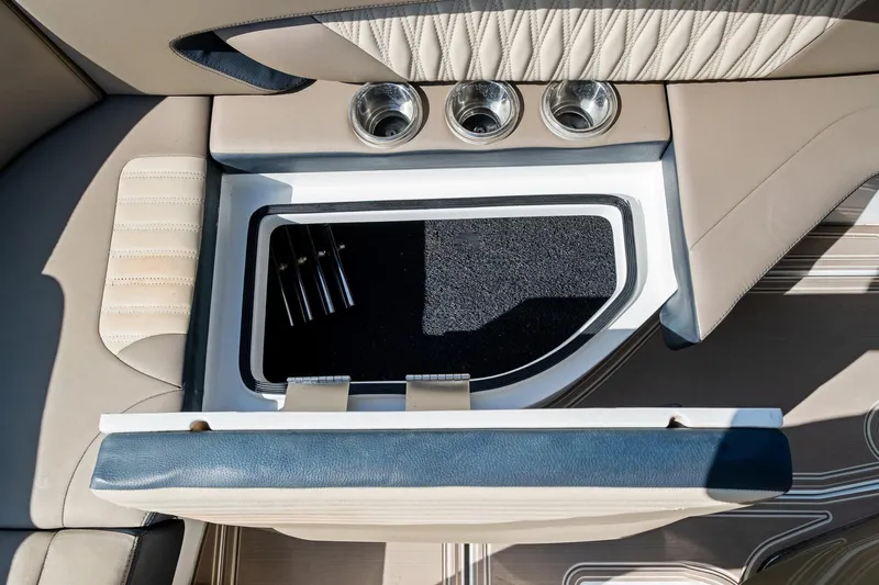 Yacht Photos Pics Luxury interior of 2021 MTI V42 boat with cup holders and storage compartment.