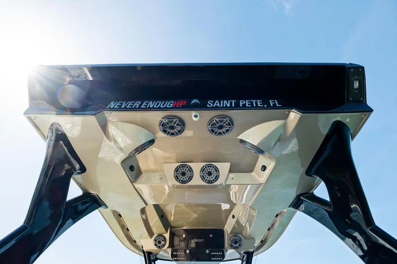  Yacht Photos Pics MTI V42 boat underside with speakers, "Never Enough HP" text, Saint Pete, FL, 2021 model.