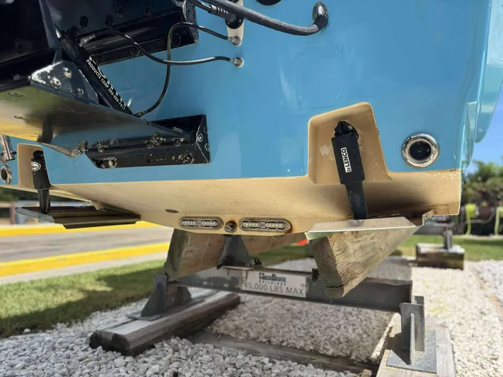  Yacht Photos Pics 2007 Andros Tarpon 26 boat hull on trailer, showcasing underside details and components.