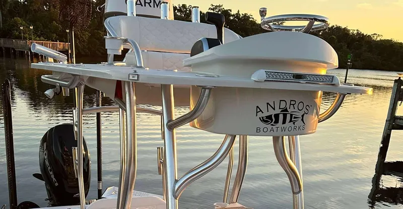  Yacht Photos Pics 2007 Andros Tarpon 26 boat with sleek design, docked at sunset.