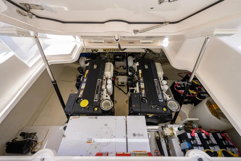  Yacht Photos Pics Engine room of 2013 Tiara Yachts 3900 Sovran, showcasing dual engines and equipment.
